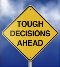 "Tough Decisions Ahead" road sign