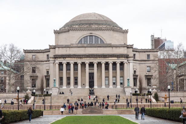 Columbia University building with students in front