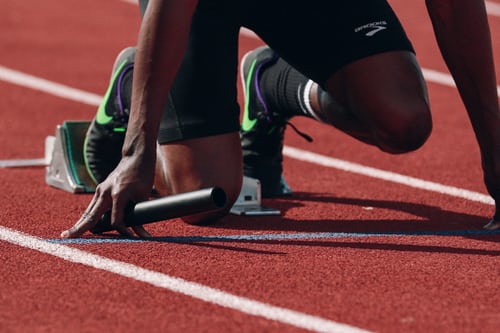 close up of track runner at starting line