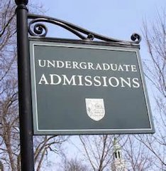 undergraduate college admissions sign with sky background